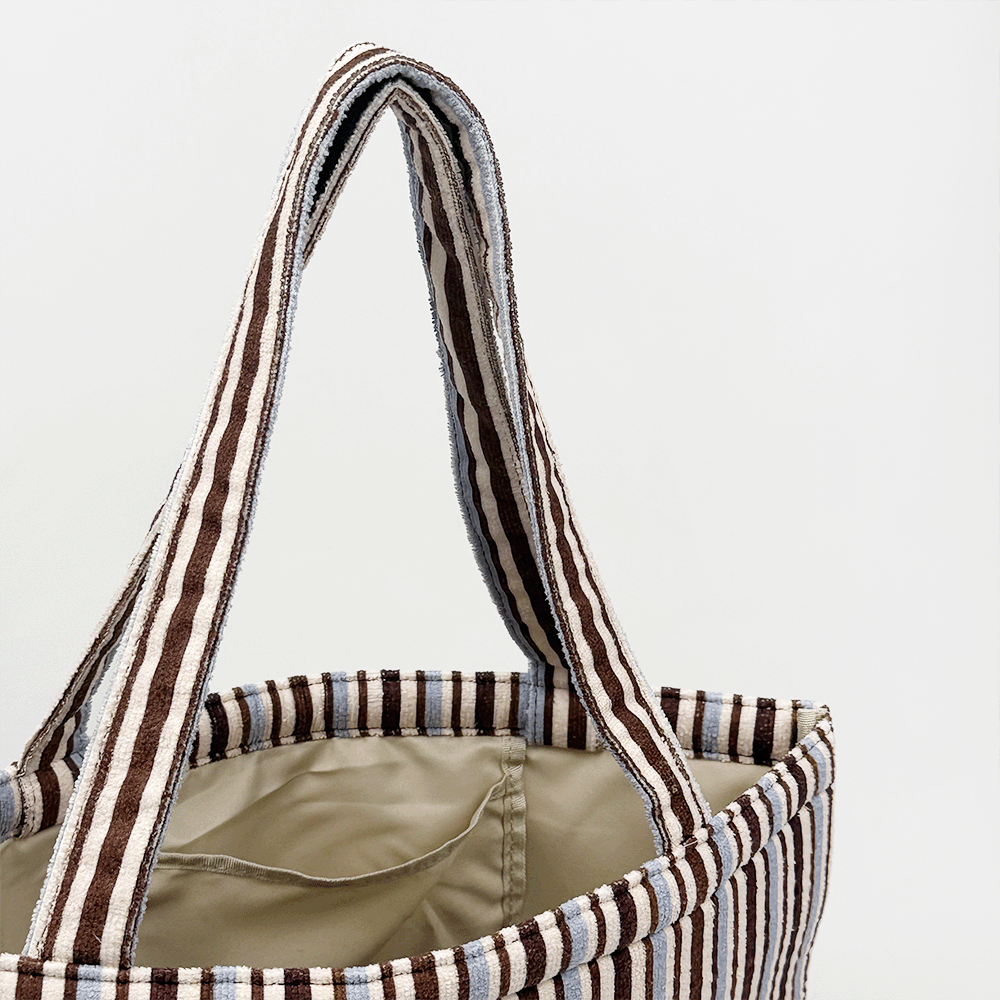 Brown, white and blue striped Tote Bag with inside pocket.