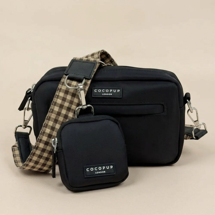 Black Cocopup Dog Walking Bag with Treat Pouch attached and check design brown bag strap.