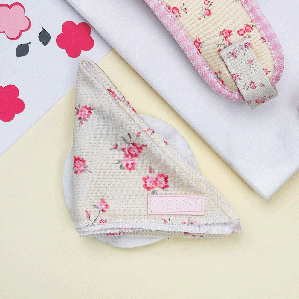 Floral Dog Bandana with yellow background and pink flowers.