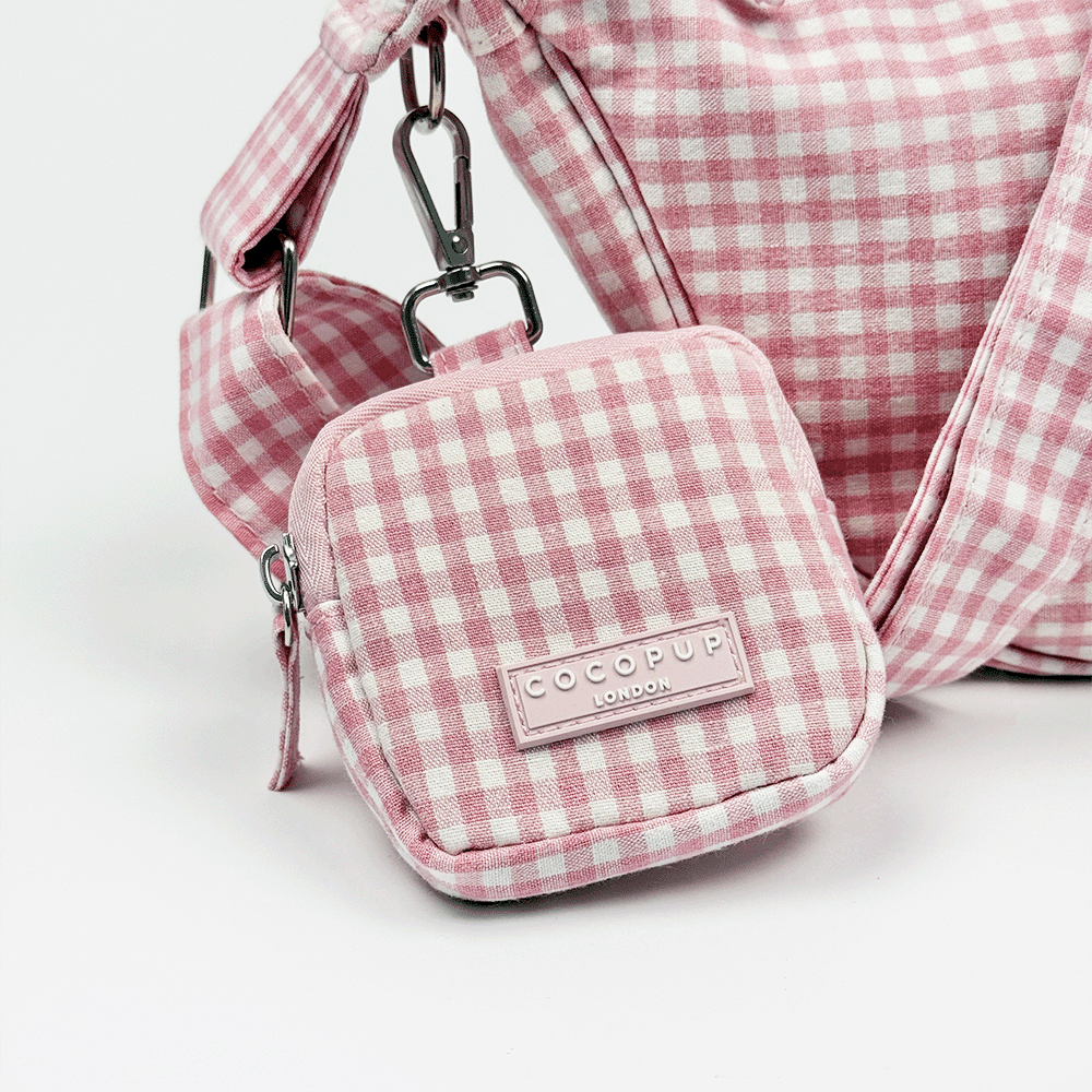 Pink and white gingham check design treat pouch for dog treats.