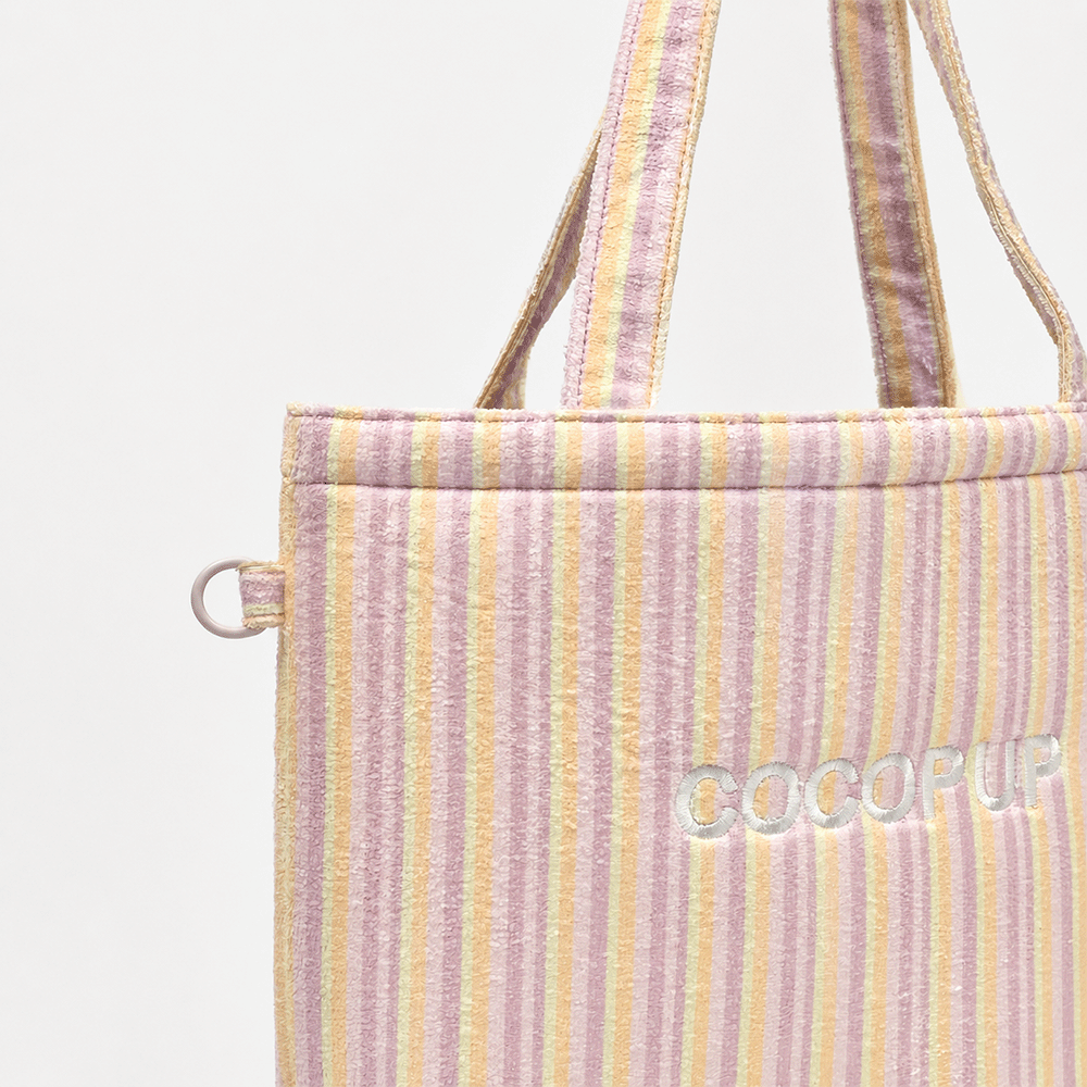 Pink, yellow and orange striped Tote Bag with D-Ring on side.