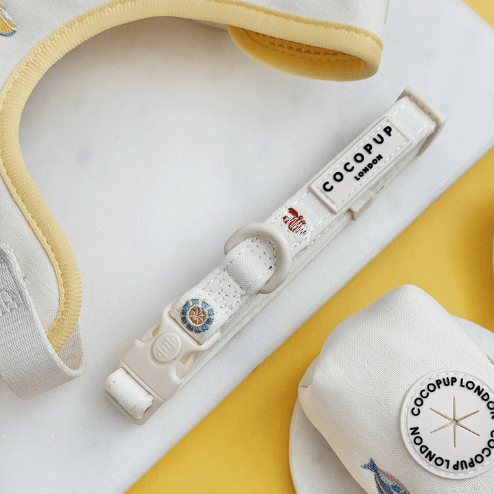 White linen fabric Dog Collar with summer embroidered embellishments.